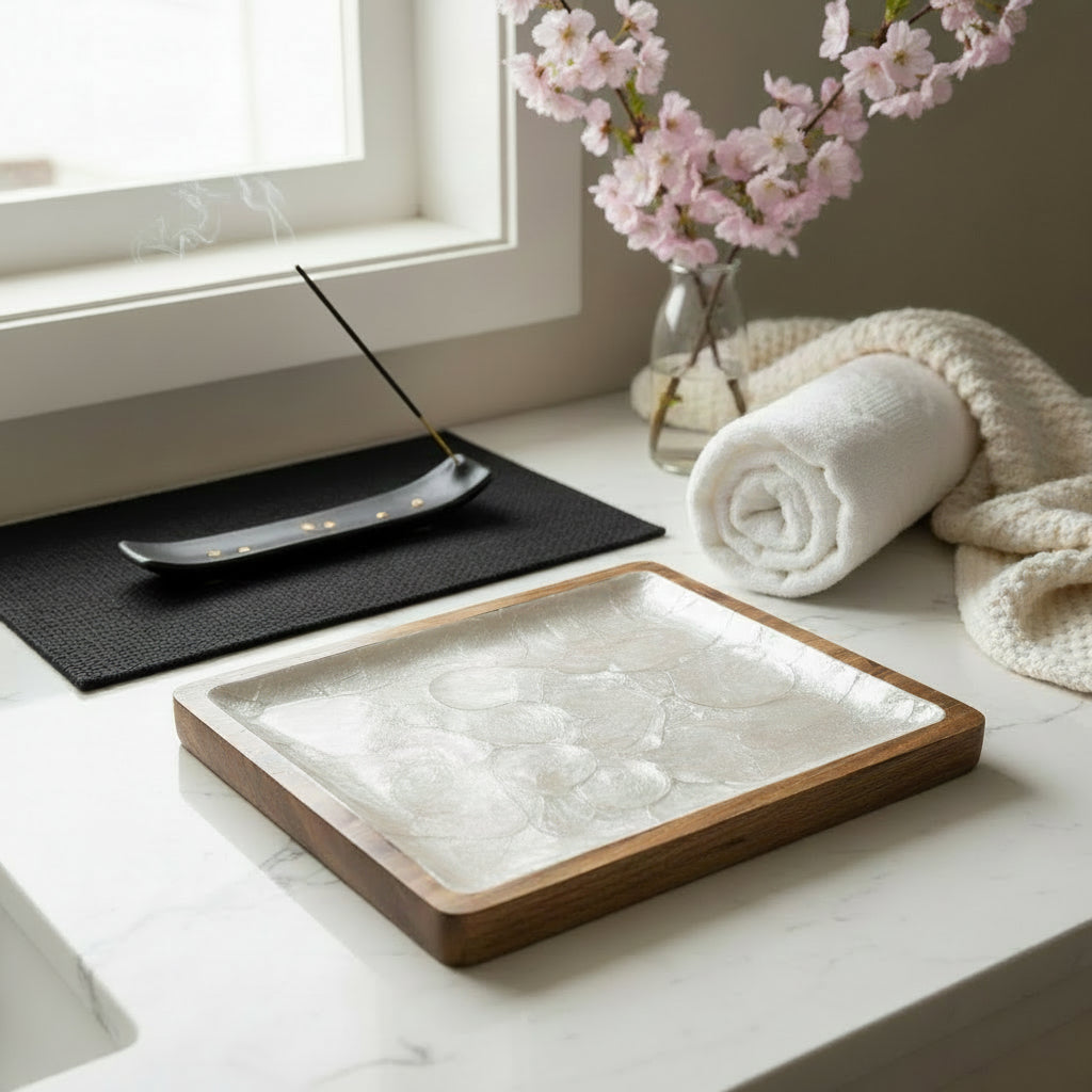Handcrafted square tray featuring natural mother-of-pearl shell and hardwood styled in refined interior by Lumora Luxe