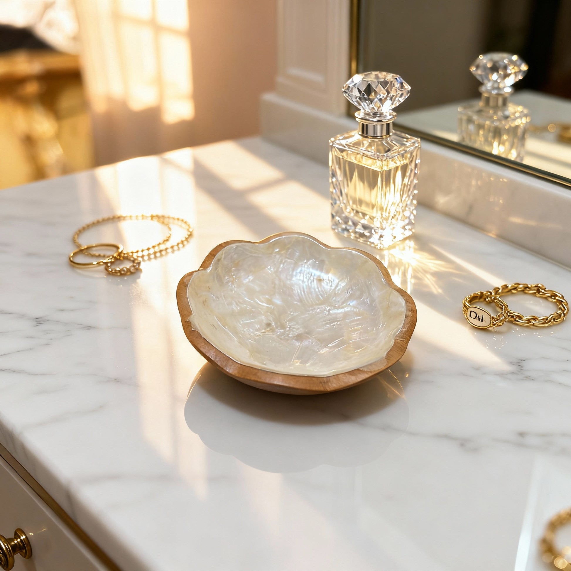 Handcrafted small dish featuring natural mother-of-pearl shell and hardwood styled in elegant setting by Lumora Luxe
